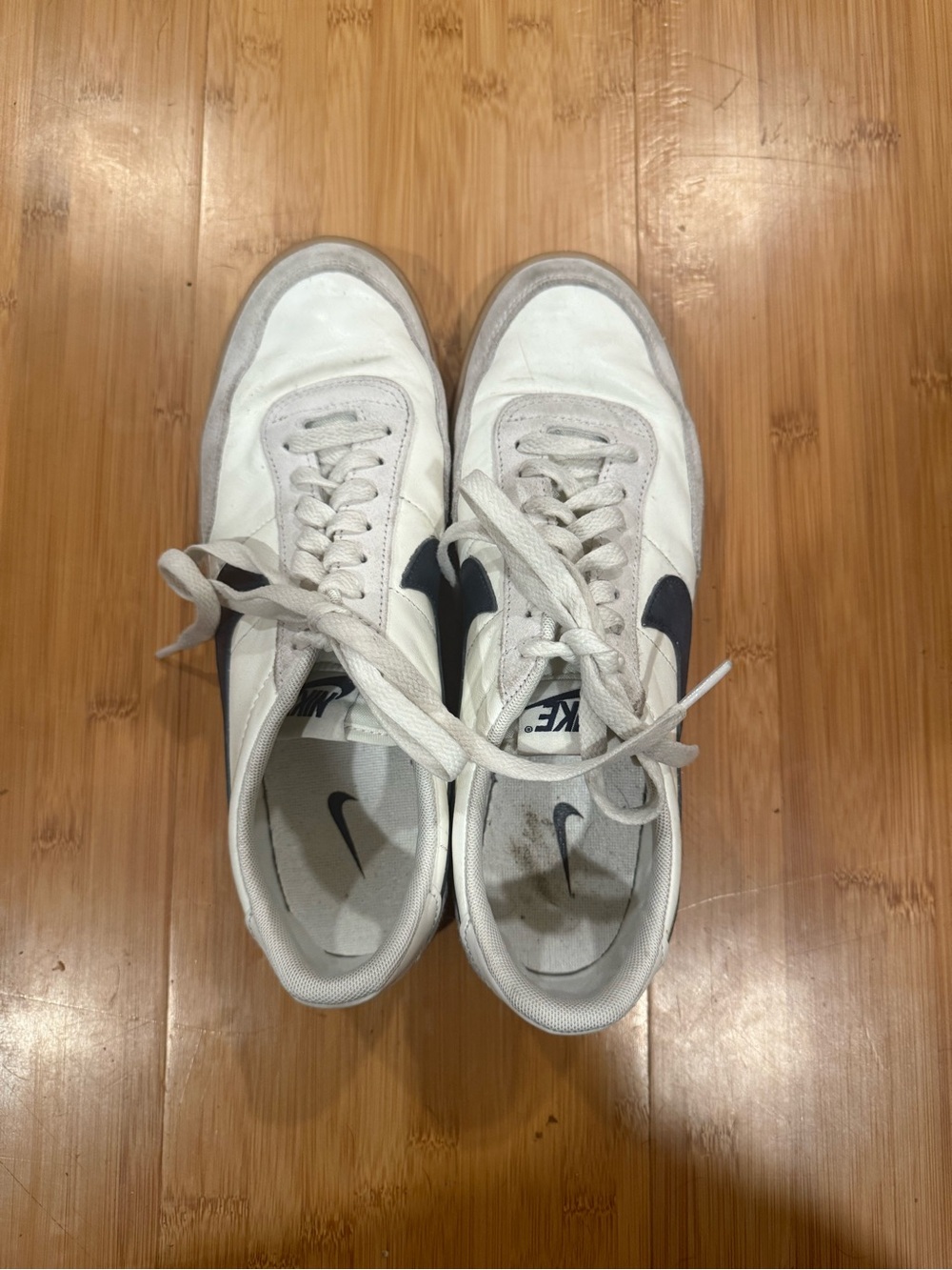 Nike White Sneakers with Black Swoosh